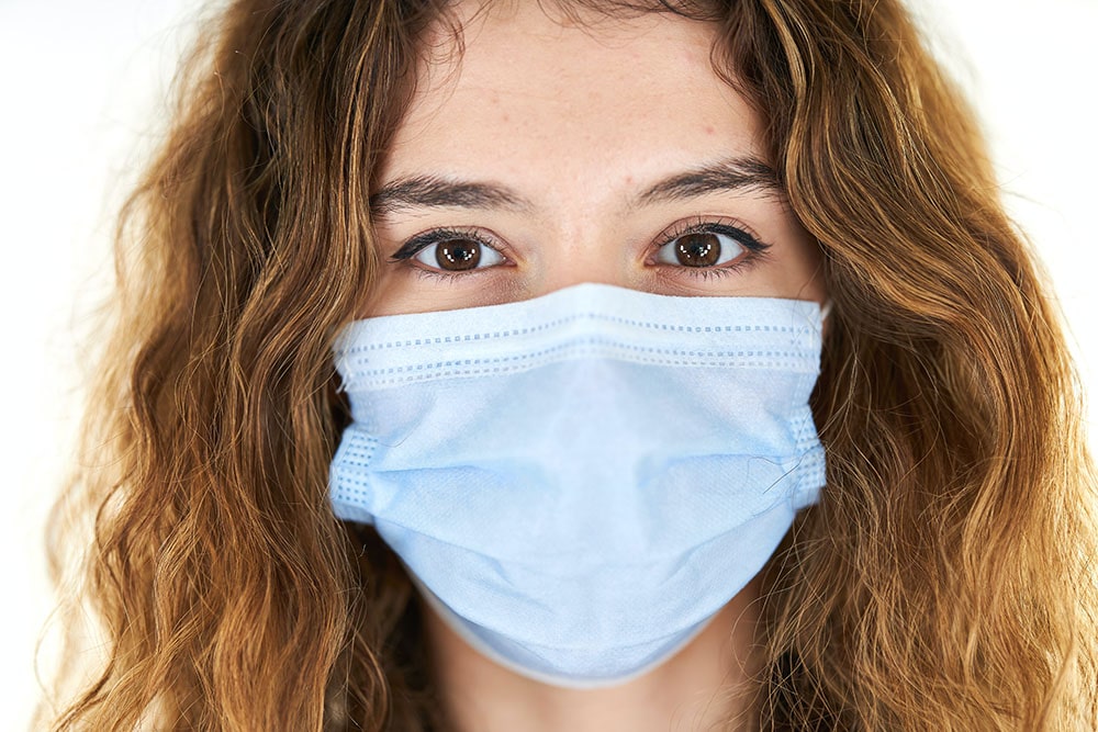 Woman wearing protective medical mask
