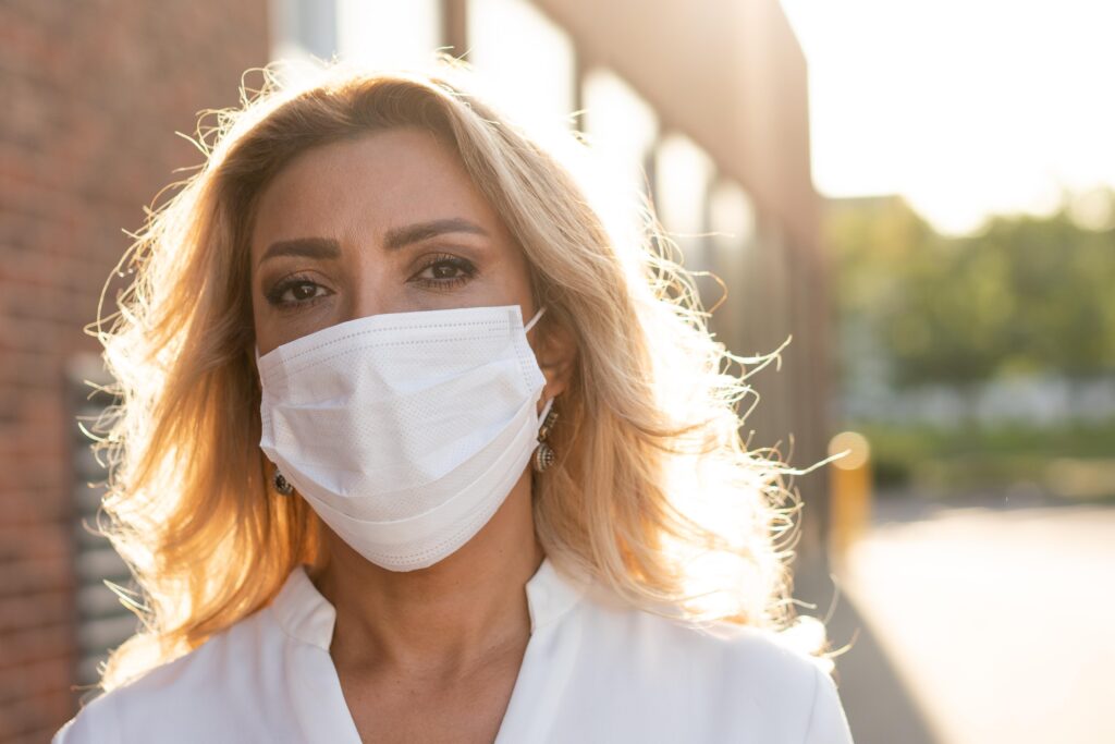 Woman wearing protective medical mask
